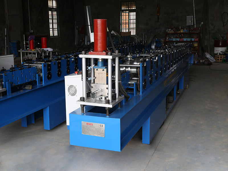 Shutter door guide roll forming machine